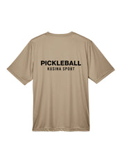 Desert khaki Kusina pickleball performance tee with black text on the back for sport enthusiasts